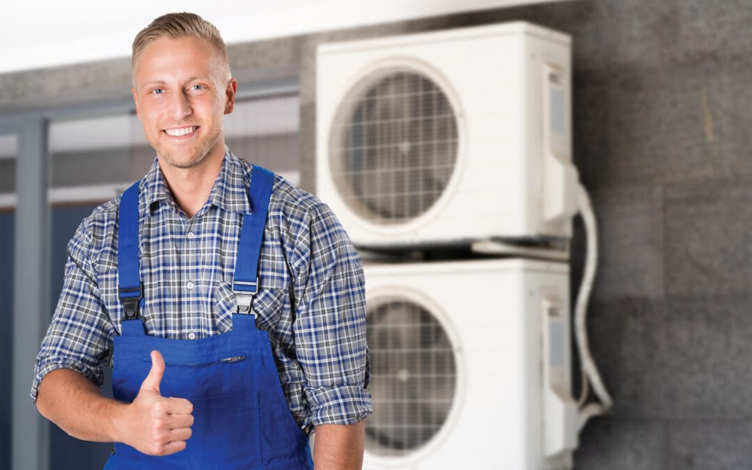 HVAC technician servicing a commercial air conditioning unit